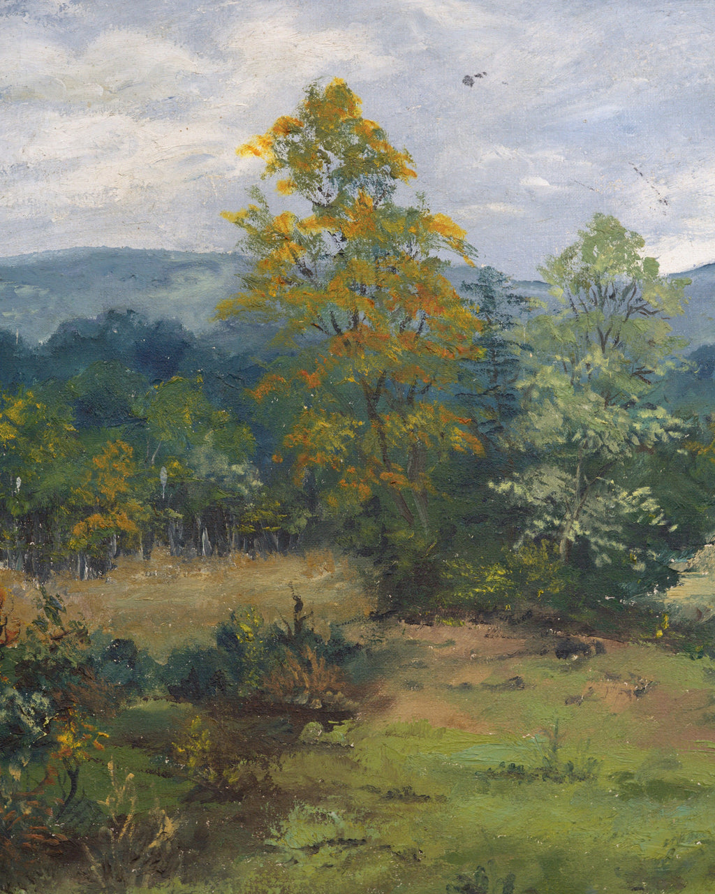 Close detail (trees) of the Sheila Beckley English landscape painting with autumn trees, meadow and blue hills in a striped wood frame.