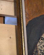 Side view of the frame edge on the Priscilla Bender-Shore 1963 self portrait in a navy jacket and beaded necklace on burnt orange, in a gilt frame.