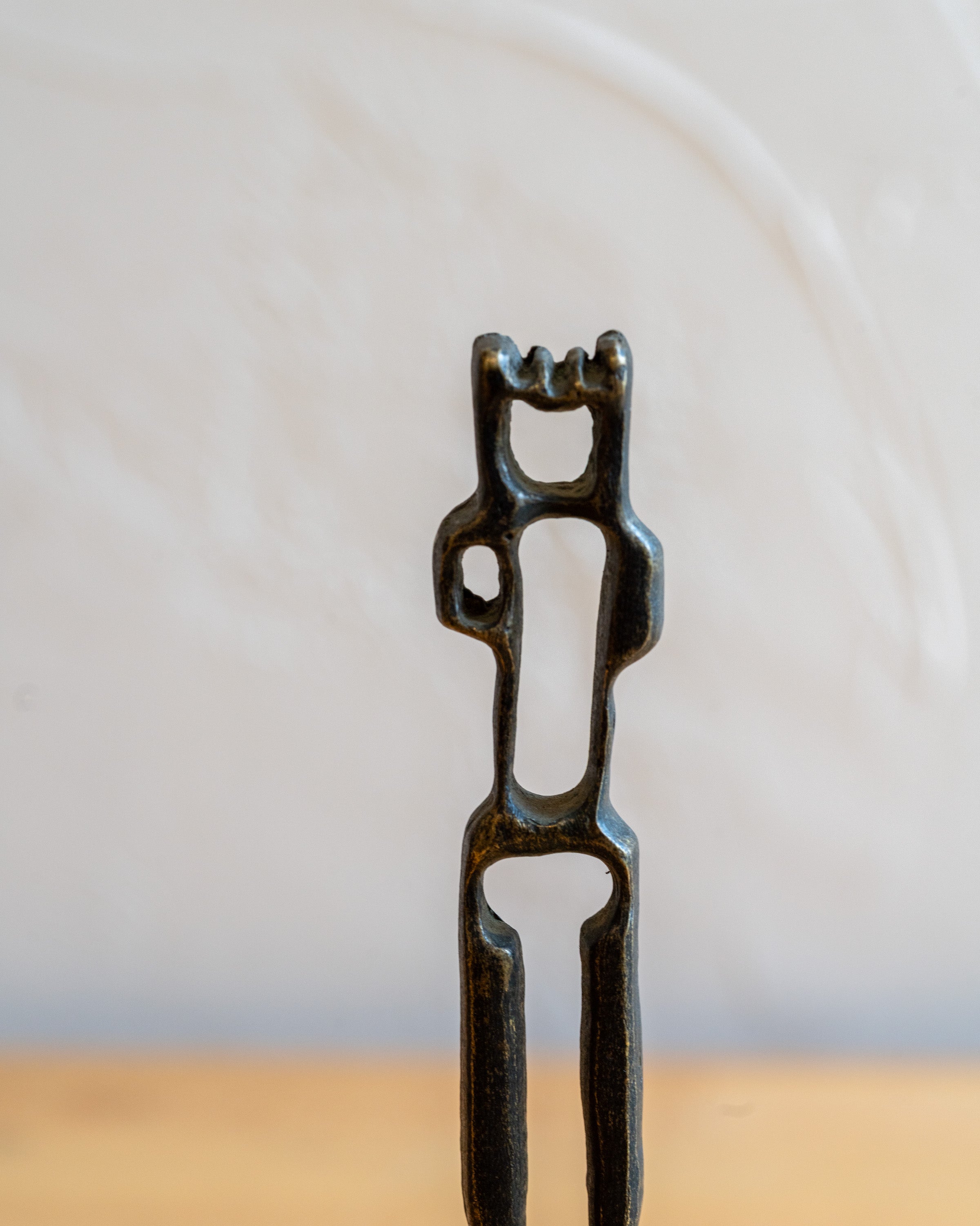 Vintage Cast Iron Brutalist Sculpture of Man on Brass and Wood Base