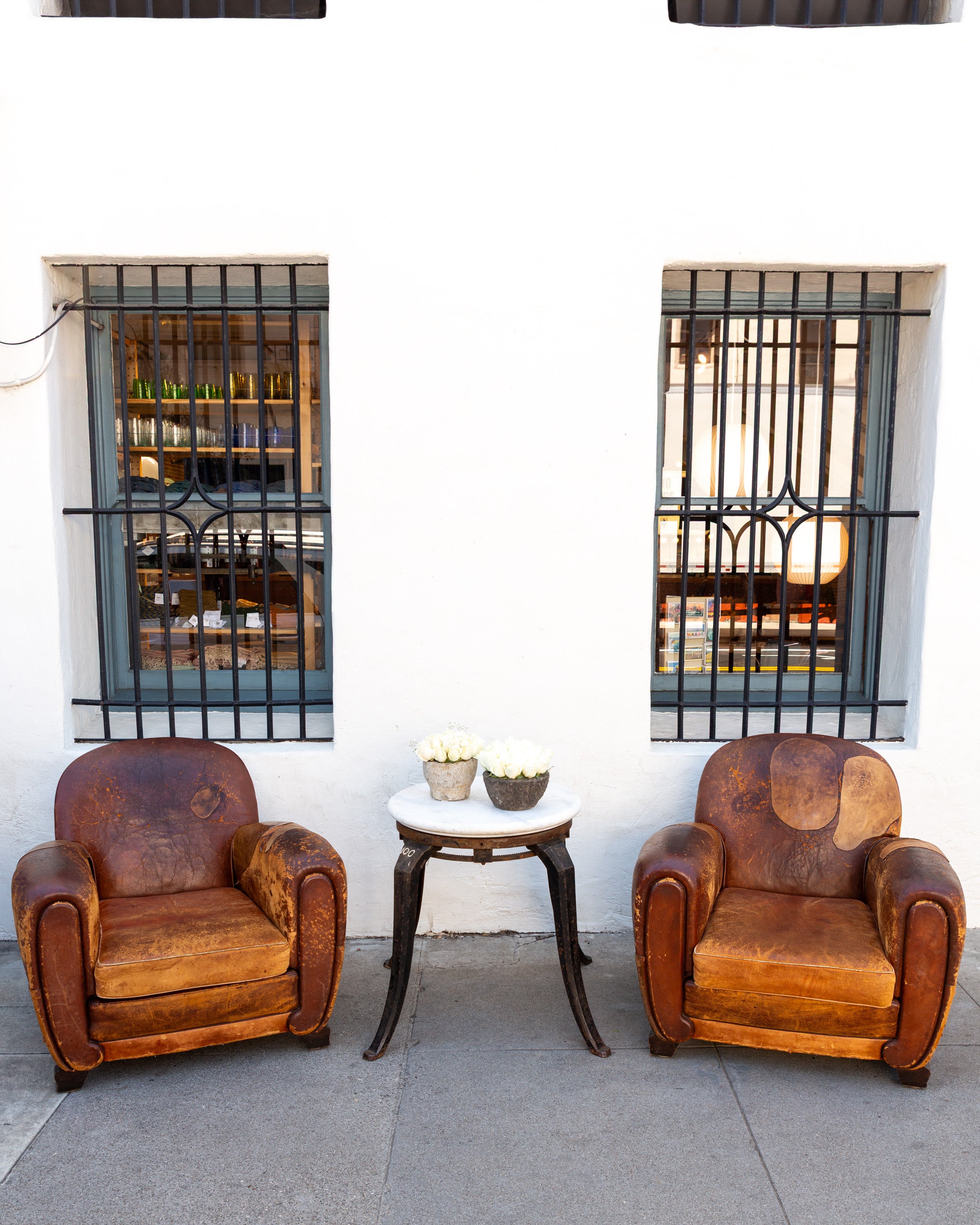 Pair of 1920's French Club Chairs with Leather Patches
