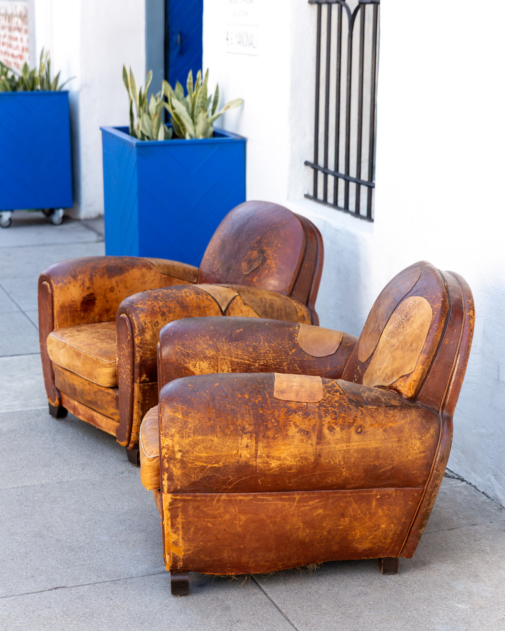 Pair of 1920's French Club Chairs with Leather Patches