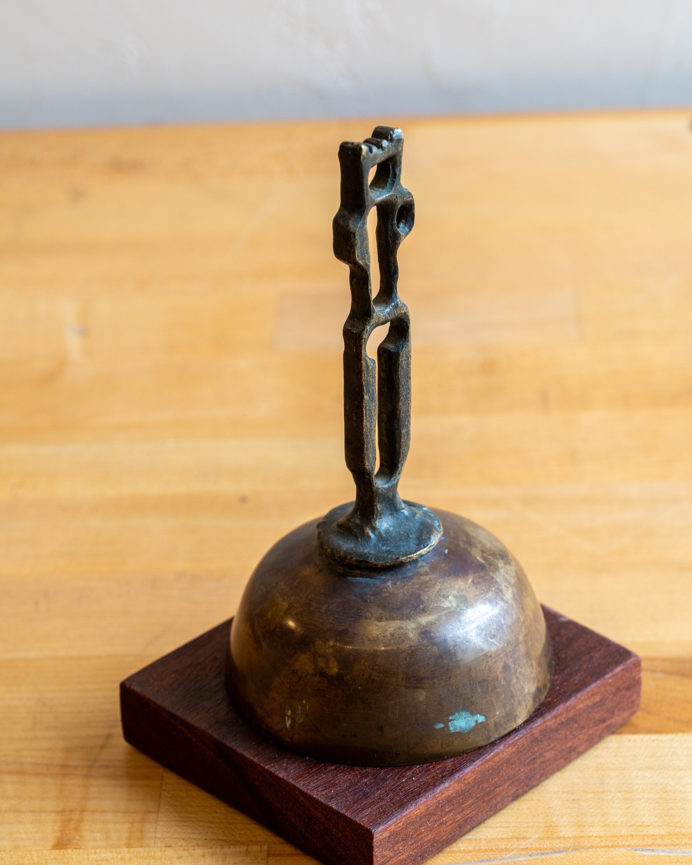 Vintage Cast Iron Brutalist Sculpture of Man on Brass and Wood Base