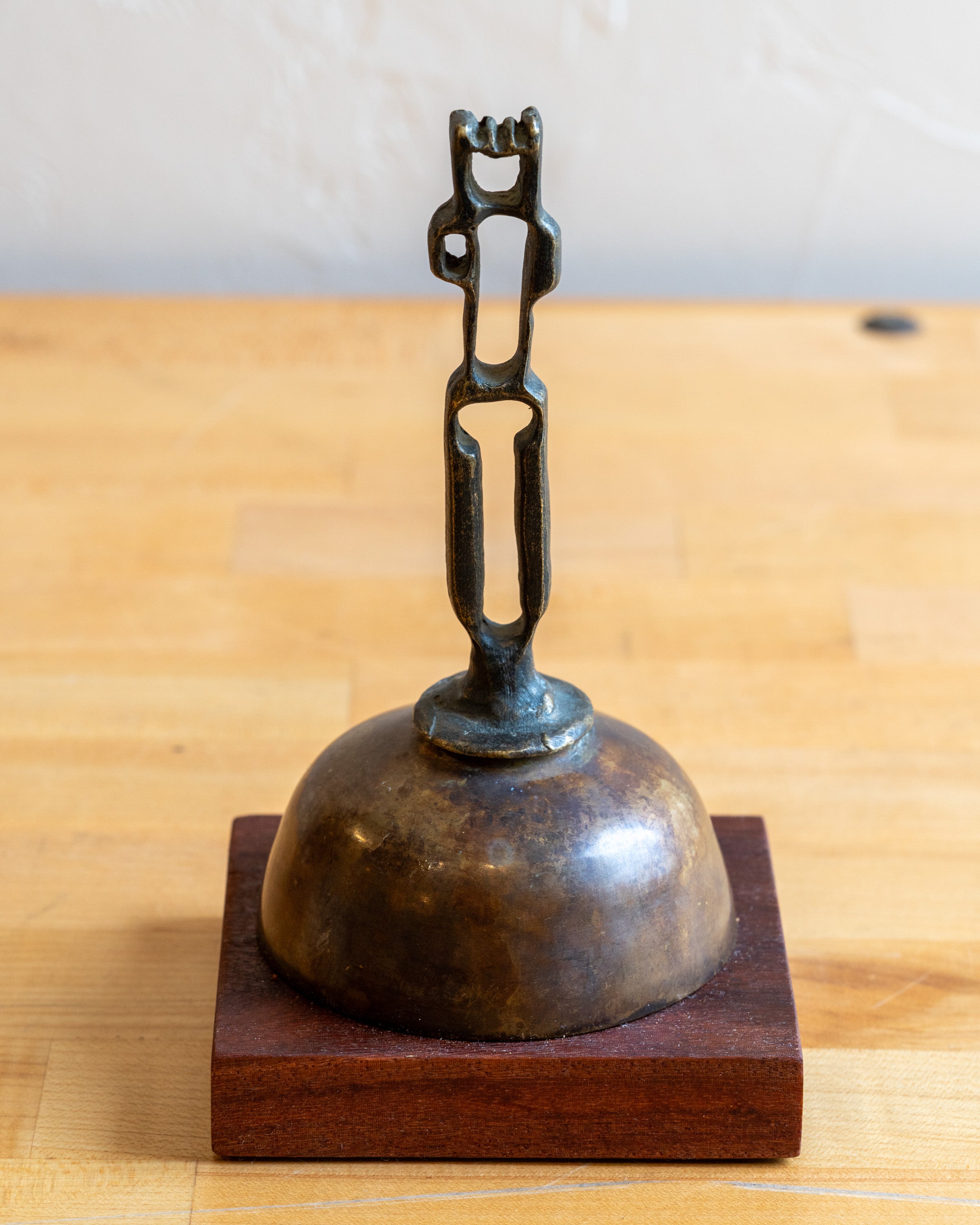 Vintage Cast Iron Brutalist Sculpture of Man on Brass and Wood Base