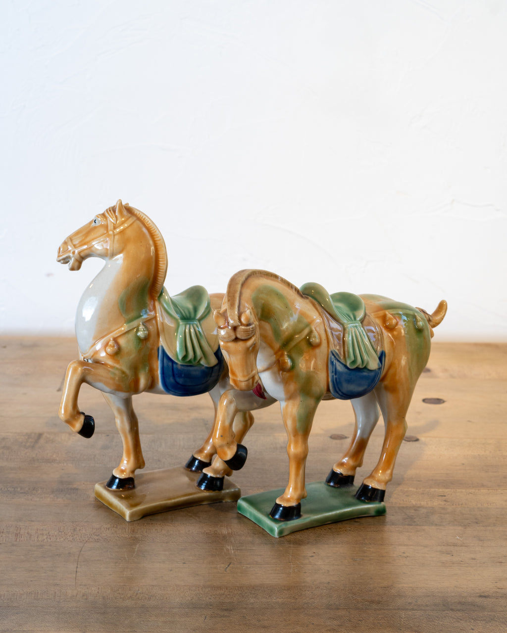Pair of vintage Tang Dynasty style ceramic war horses