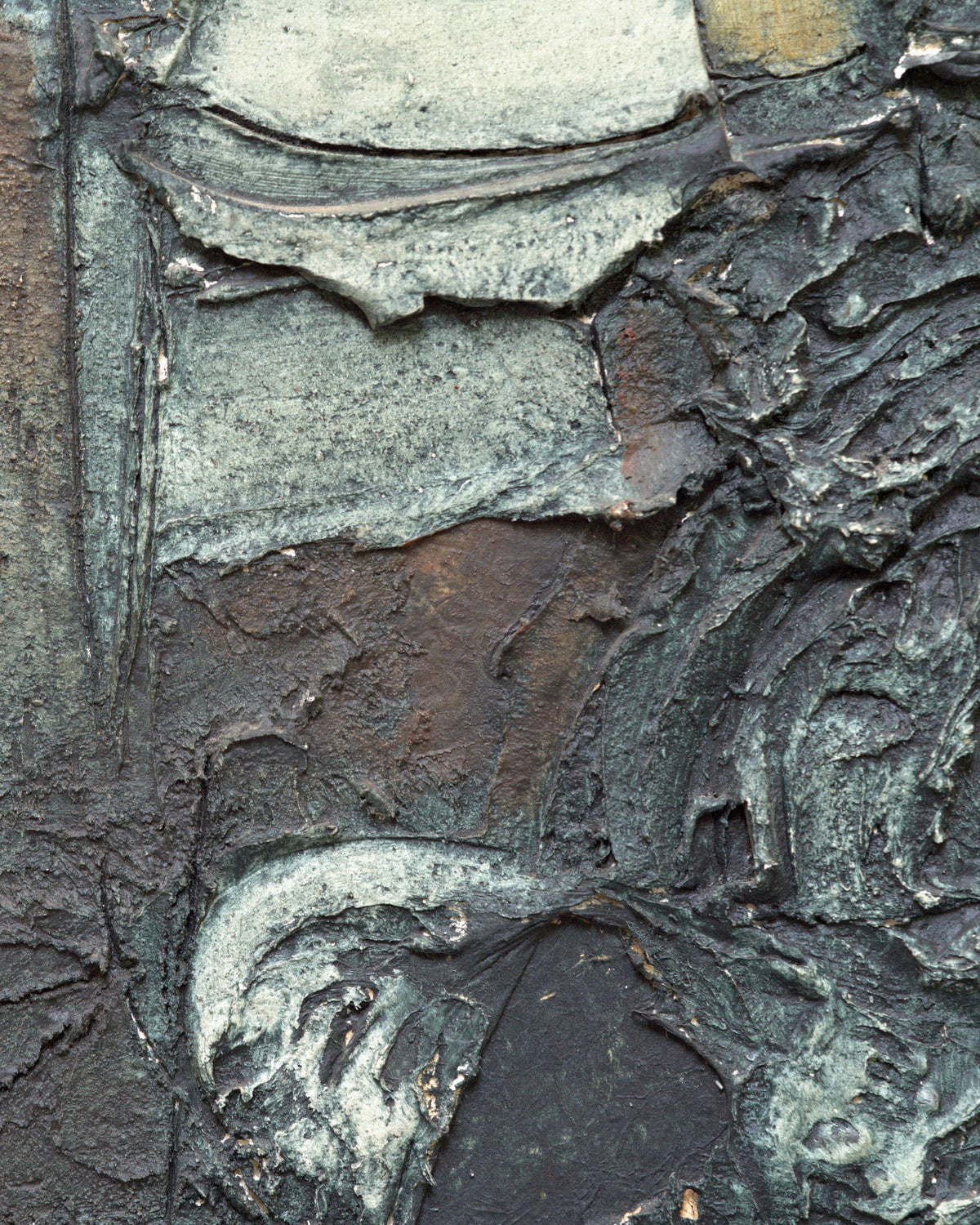 Close detail (swirl) of the Ray Jacobsen 1966 plaster relief abstract in slate blue, cream and olive in a silver strip frame.