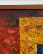 Close detail (frame) of the mid century geometric abstract painting in red, mustard and teal impasto in a narrow wood frame.