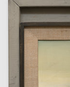Side view of the frame edge on the Joseph Knowles California desert landscape with lavender mountains and rabbitbrush in a gray frame with linen liner.
