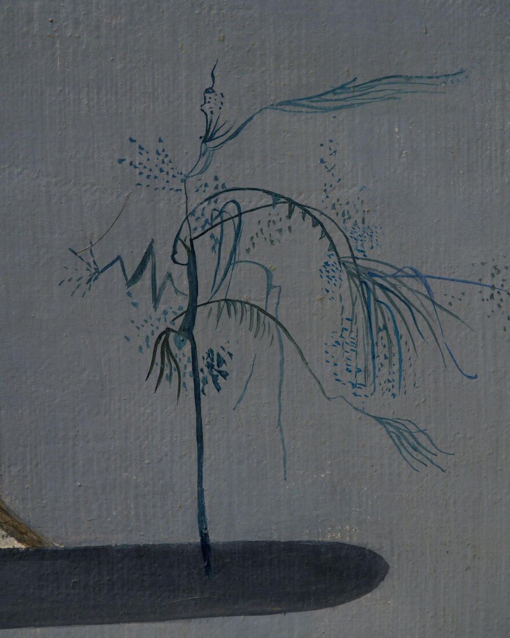 Close detail (sprig) of the F. Luccardi 1950s surrealist painting with a dark central stand and collage-like shapes on gray, in a black and gilt frame.