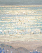Close detail (surf) of the Frank Montague Moore painting of sand dunes with blue lupine and a silver sea in a ribbed gilt frame.