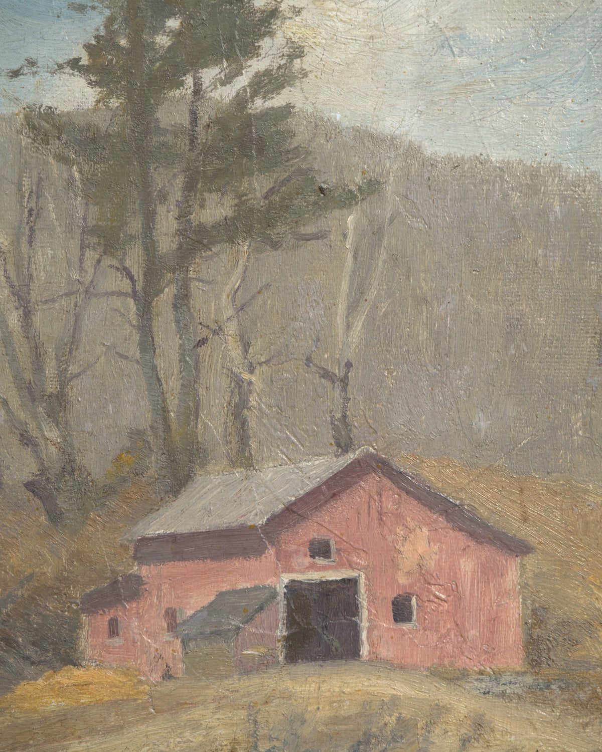 Close detail (barn) of the DeWitt Parshall painting of a red barn below bare trees in early spring in a wood frame with linen liner.