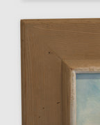 Corner of the frame on the James Proctor painting of granite boulders in Lake Tahoe in a wide natural wood frame.