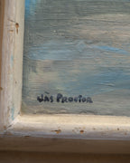 Detail of the signature on the James Proctor painting of granite boulders in Lake Tahoe in a wide natural wood frame.